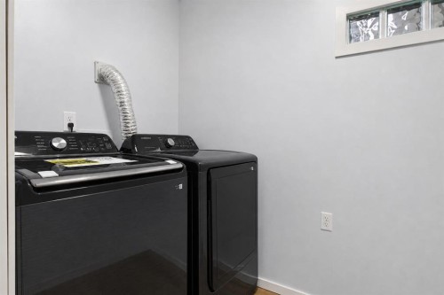 250 Bridlewood Circle Sw, Calgary, AB - Indoor Photo Showing Laundry Room