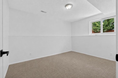 250 Bridlewood Circle Sw, Calgary, AB - Indoor Photo Showing Other Room