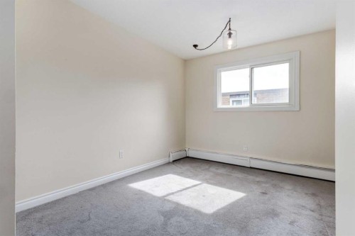 303-730 2 Avenue Nw, Calgary, AB - Indoor Photo Showing Other Room
