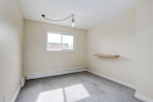 303-730 2 Avenue Nw, Calgary, AB - Indoor Photo Showing Other Room