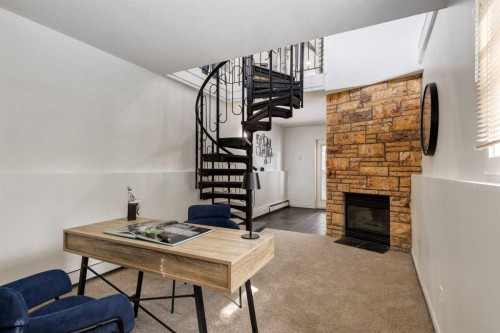 3-906 4 Avenue Nw, Calgary, AB - Indoor With Fireplace