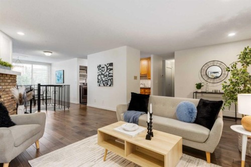 3-906 4 Avenue Nw, Calgary, AB - Indoor Photo Showing Living Room