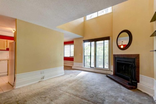 20-821 3 Avenue Sw, Calgary, AB - Indoor Photo Showing Other Room With Fireplace