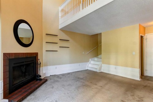 20-821 3 Avenue Sw, Calgary, AB - Indoor With Fireplace