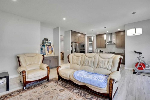 50 Saddlestone Place Ne, Calgary, AB - Indoor Photo Showing Living Room