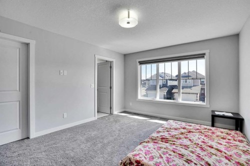 50 Saddlestone Place Ne, Calgary, AB - Indoor Photo Showing Bedroom