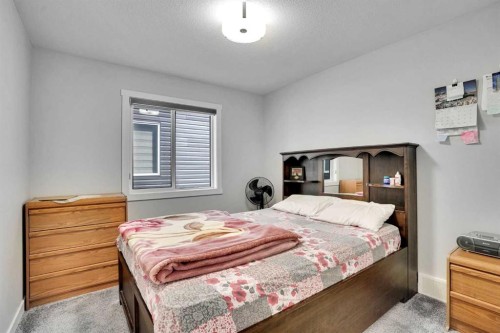 50 Saddlestone Place Ne, Calgary, AB - Indoor Photo Showing Bedroom