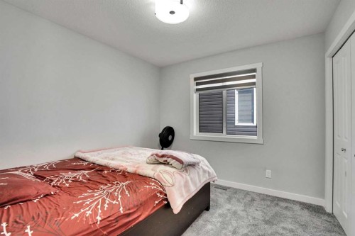 50 Saddlestone Place Ne, Calgary, AB - Indoor Photo Showing Bedroom