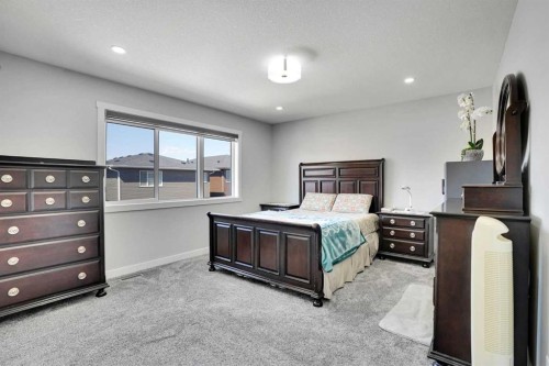50 Saddlestone Place Ne, Calgary, AB - Indoor Photo Showing Bedroom