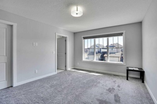 50 Saddlestone Place Ne, Calgary, AB - Indoor Photo Showing Other Room