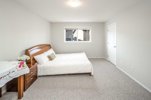 96 Panamount Manor Nw, Calgary, AB - Indoor Photo Showing Bedroom