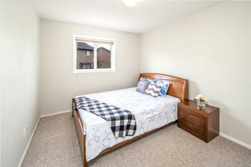 96 Panamount Manor Nw, Calgary, AB - Indoor Photo Showing Bedroom