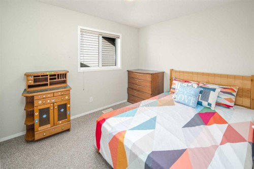 96 Panamount Manor Nw, Calgary, AB - Indoor Photo Showing Bedroom