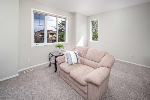 96 Panamount Manor Nw, Calgary, AB - Indoor Photo Showing Living Room