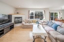 96 Panamount Manor Nw, Calgary, AB  - Indoor Photo Showing Living Room With Fireplace 