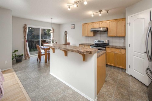 96 Panamount Manor Nw, Calgary, AB - Indoor Photo Showing Kitchen With Stainless Steel Kitchen