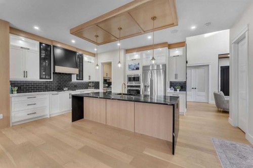 2012 Waterbury Road, Chestermere, AB - Indoor Photo Showing Kitchen With Upgraded Kitchen