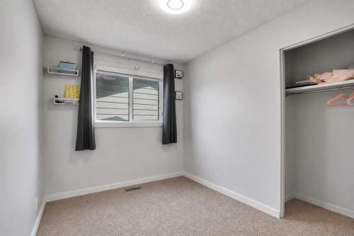 115 Abingdon Crescent Ne, Calgary, AB - Indoor Photo Showing Other Room