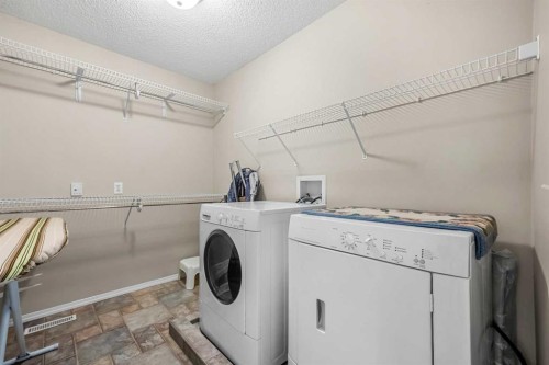 31 Elgin Green Se, Calgary, AB - Indoor Photo Showing Laundry Room