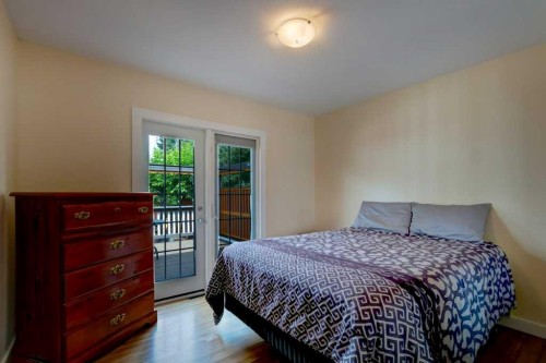48 Hillary Crescent Sw, Calgary, AB - Indoor Photo Showing Bedroom