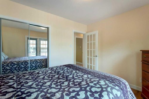 48 Hillary Crescent Sw, Calgary, AB - Indoor Photo Showing Bedroom