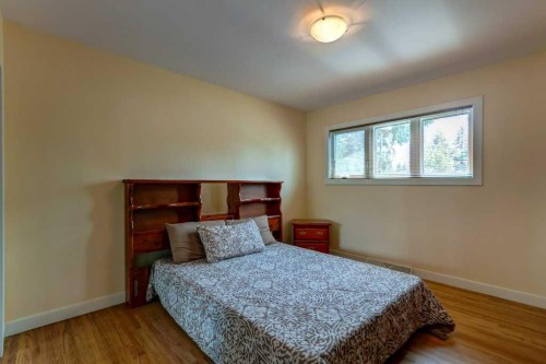 48 Hillary Crescent Sw, Calgary, AB - Indoor Photo Showing Bedroom