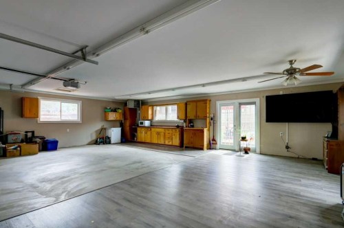 48 Hillary Crescent Sw, Calgary, AB - Indoor Photo Showing Garage