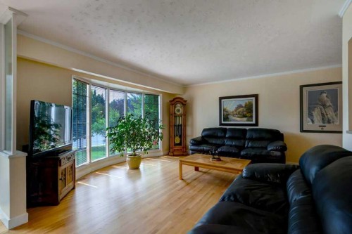 48 Hillary Crescent Sw, Calgary, AB - Indoor Photo Showing Living Room