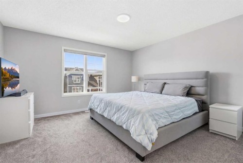 44 Amblefield Avenue Nw, Calgary, AB - Indoor Photo Showing Bedroom
