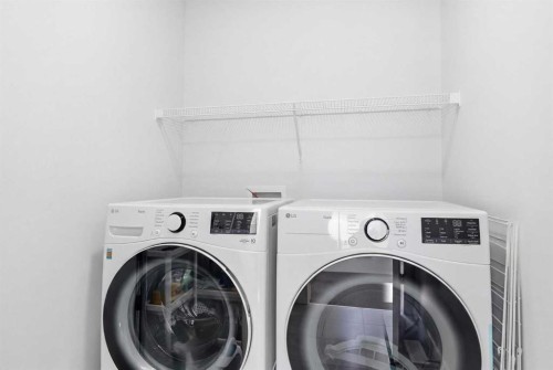 44 Amblefield Avenue Nw, Calgary, AB - Indoor Photo Showing Laundry Room