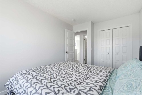 44 Amblefield Avenue Nw, Calgary, AB - Indoor Photo Showing Bedroom