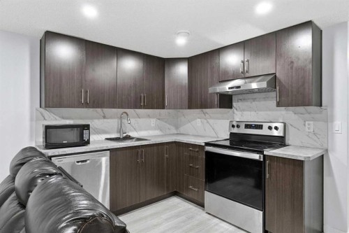 44 Amblefield Avenue Nw, Calgary, AB - Indoor Photo Showing Kitchen
