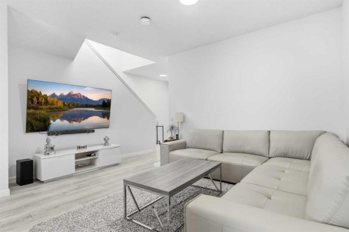 44 Amblefield Avenue Nw, Calgary, AB - Indoor Photo Showing Living Room
