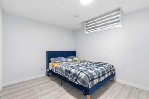 44 Amblefield Avenue Nw, Calgary, AB - Indoor Photo Showing Bedroom