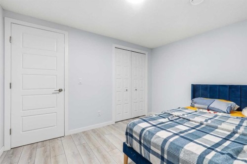 44 Amblefield Avenue Nw, Calgary, AB - Indoor Photo Showing Bedroom