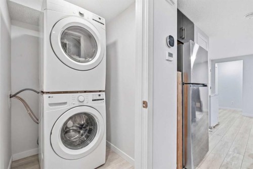 44 Amblefield Avenue Nw, Calgary, AB - Indoor Photo Showing Laundry Room