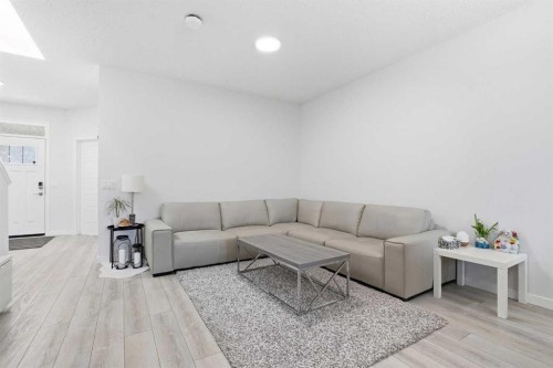 44 Amblefield Avenue Nw, Calgary, AB - Indoor Photo Showing Living Room