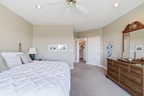 60 Prominence Point Sw, Calgary, AB - Indoor Photo Showing Bedroom