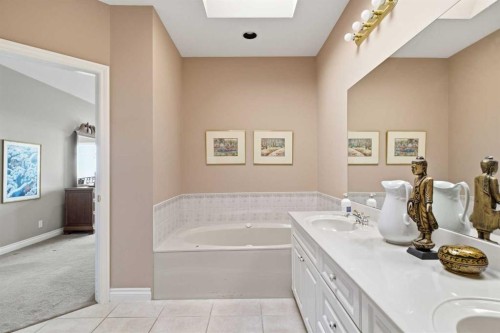 60 Prominence Point Sw, Calgary, AB - Indoor Photo Showing Bathroom