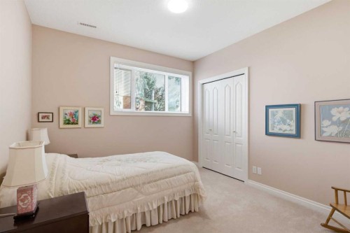 60 Prominence Point Sw, Calgary, AB - Indoor Photo Showing Bedroom