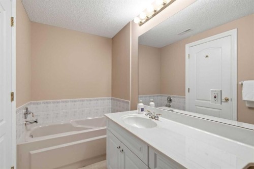 60 Prominence Point Sw, Calgary, AB - Indoor Photo Showing Bathroom