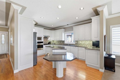 60 Prominence Point Sw, Calgary, AB - Indoor Photo Showing Kitchen With Upgraded Kitchen