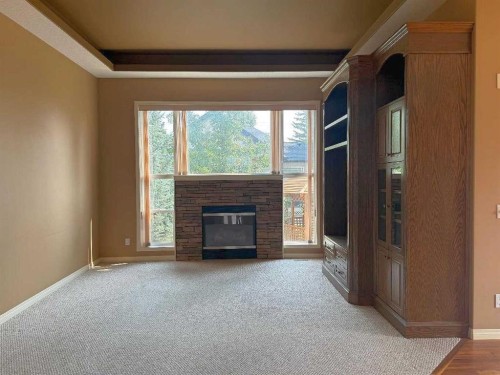 157 Valley Creek Place Nw, Calgary, AB - Indoor Photo Showing Other Room With Fireplace