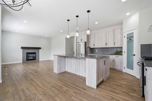 44 Cimarron Springs Circle, Okotoks, AB - Indoor Photo Showing Kitchen With Stainless Steel Kitchen With Upgraded Kitchen