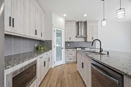 44 Cimarron Springs Circle, Okotoks, AB - Indoor Photo Showing Kitchen With Upgraded Kitchen