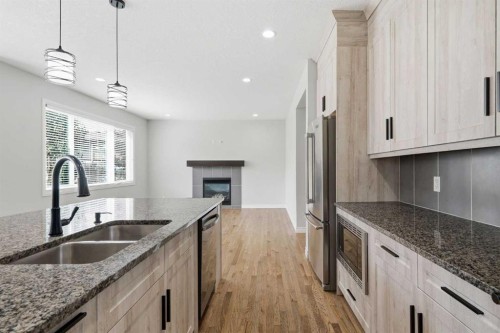 44 Cimarron Springs Circle, Okotoks, AB - Indoor Photo Showing Kitchen With Double Sink With Upgraded Kitchen