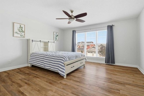 44 Cimarron Springs Circle, Okotoks, AB - Indoor Photo Showing Bedroom