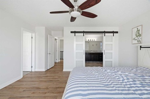 44 Cimarron Springs Circle, Okotoks, AB - Indoor Photo Showing Bedroom