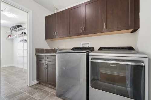 44 Cimarron Springs Circle, Okotoks, AB - Indoor Photo Showing Laundry Room