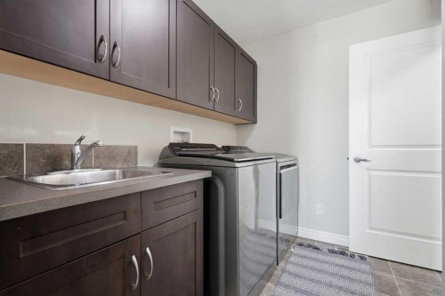 44 Cimarron Springs Circle, Okotoks, AB - Indoor Photo Showing Laundry Room